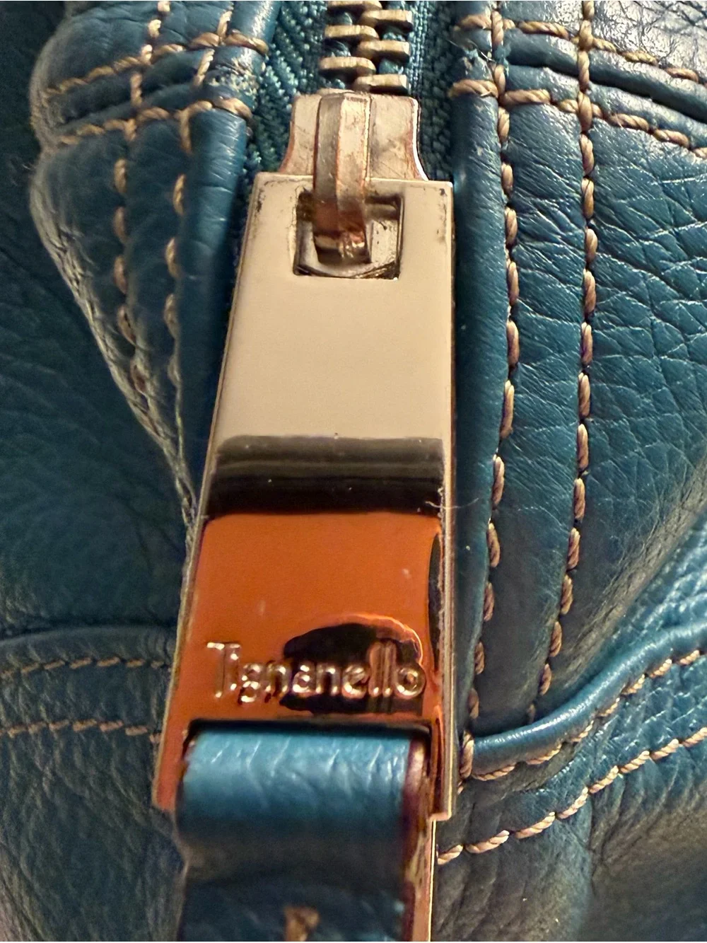 Tignanello teal blue pebbled leather satchel with silver toned hardware.